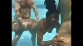 Hot mulatto having sex in the pool