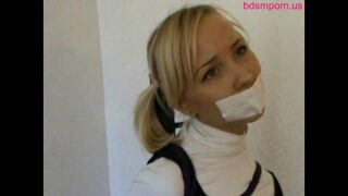 Girls taped up and gagged