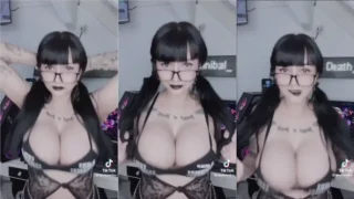 Baileshot adult video of busty tattooed girl