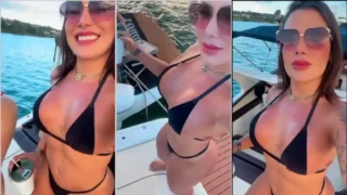 Brazilian hot desk Wife walking a speedboat